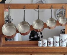 French Antique 5 copper pots with free standing oak stand plus 5 set of ceramic storage jars