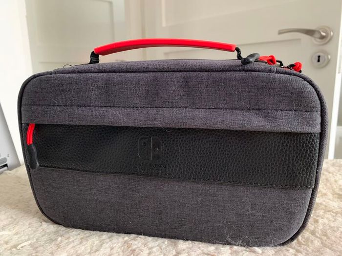 Nintendo Switch Console with accessories and carry case