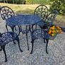 Vintage cast aluminium table and chairs Image 2