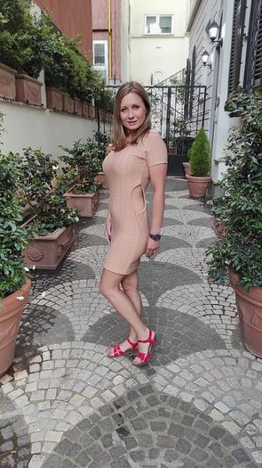 Beige dress with cutouts