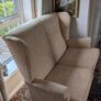 Newly upholstered Parker Knoll high-backed two-seater wingback settee Image 4