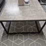Concrete-effect coffee table with black metal frame Image 2