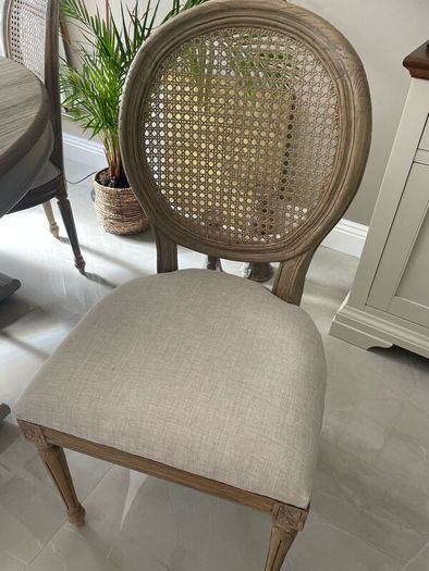 Dining table round 140cm with 6 rattan back chairs