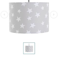 A lovely star print drum lampshade in excellent condition - perfect for kids' bedroom. Neutral grey shade. Fun and stylish!