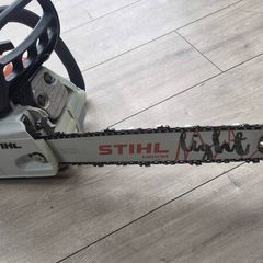 new still. chainsaw. m