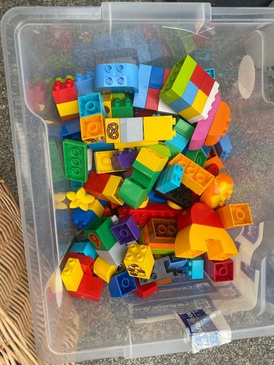 Box of Lego. 4 Figures and 4 Small Base Plates