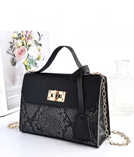 Black snakeskin twist lock bag