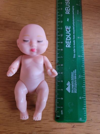 Mini baby dolls in sweet outfits