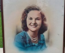 Archival, hand-colored portrait of a woman