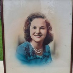 Archival, hand-colored portrait of a woman