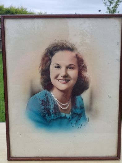 Archival, hand-colored portrait of a woman