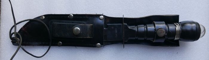 Vintage 1980s Survival Knife with compass and a storage compartment in the knife handle