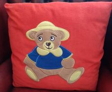 Large red teddy cushion