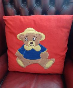 Large red teddy cushion