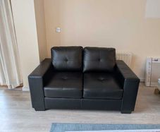 2-seater couch (black) in excellent condition (200 EUR negotiable)