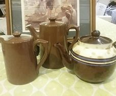Three brown TeaWares