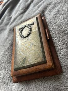 Silver vintage leather-bound notebook