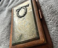 Silver vintage leather-bound notebook