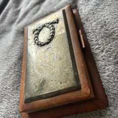 Silver vintage leather-bound notebook