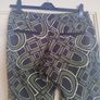 River Island green and black trousers Image 2