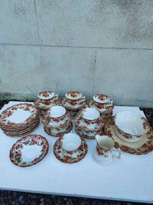 Vintage tea set, 1940's or earlier, with gold edging and floral pattern. Cafe wedding decor