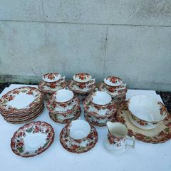 Vintage tea set, 1940's or earlier, with gold edging and floral pattern. Cafe wedding decor