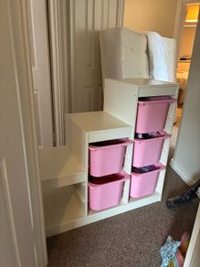 Ikea trofast with pink buckets