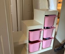 Ikea trofast with pink buckets