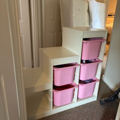 Ikea trofast with pink buckets