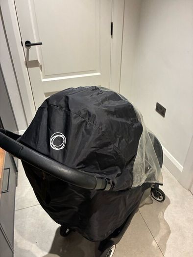 Bugaboo Butterfly with rain cover, standing board