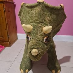 dinosaur sit on