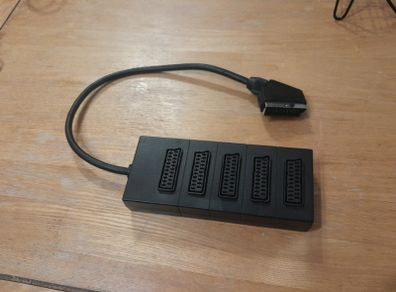 Scart Cable, 4 into 1, adapter box. Un-used.