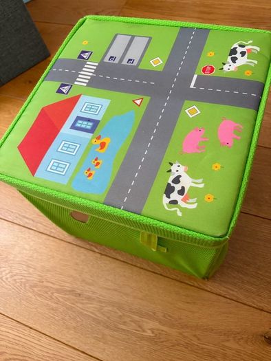 three toy cars playing mats
