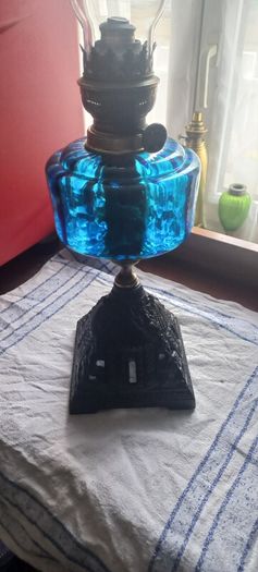 Antique Blue Glass Brass and cast iron metal large table oil lamp in very good condition and working