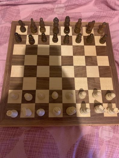 Boxed wooden chess board, prices and checkers set