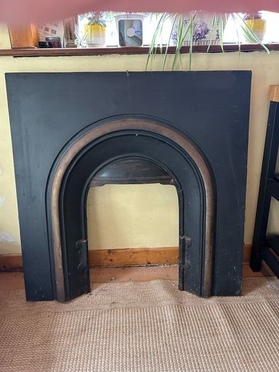Cast iron fireplace insert