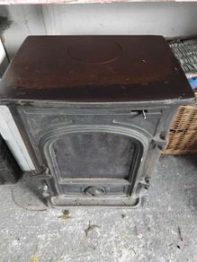 stoves top needs bit of spray leave it like new lit a handful of times  genuine the original fire bricks in it  never coal burned in it  old lady had it and had kettle on top of it that's why it needs bit of spray heat proof won't be disappointed with thi