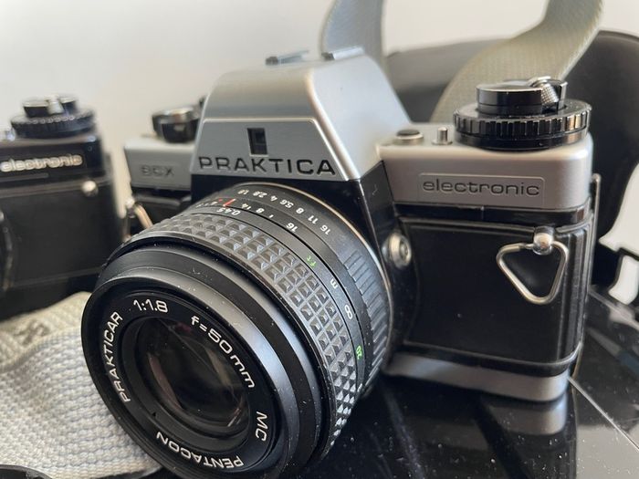 2x film camera 3x lenses