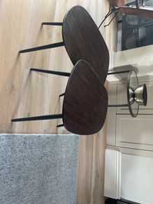 2 coffee tables in dark wood/ black legs. Unused. From Arnotts. Kidney shaped.