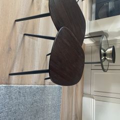 2 coffee tables in dark wood/ black legs. Unused. From Arnotts. Kidney shaped.