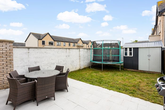 Garden trampoline with safety enclosure