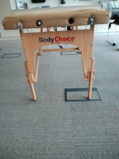 Massage table
