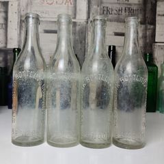 324 - Set of 4 Vintage Clear Glass Collectible Decorative West Cork Bottling Company Bandon Bottles