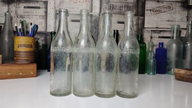 324 - Set of 4 Vintage Clear Glass Collectible Decorative West Cork Bottling Company Bandon Bottles