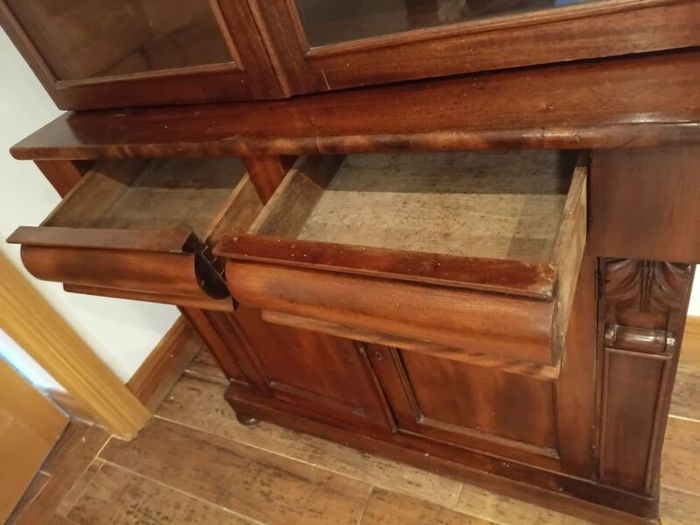 Two-door antique Victorian mahogany bookcase