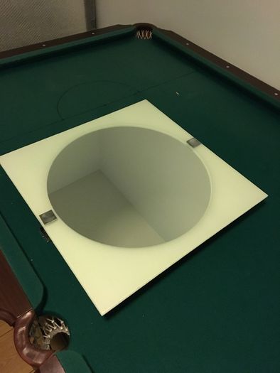 Tilting bathroom mirror