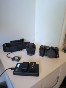 Sony Alpha a6100 bundle with 50mm f/1.8 lens, batteries, charger and strap [Excellent condition]