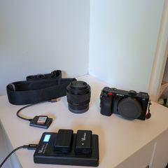 Sony Alpha a6100 bundle with 50mm f/1.8 lens, batteries, charger and strap [Excellent condition]