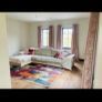 Large L-shaped cream couch Image 2