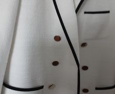 ladies jcream /Black trimmed jacket
